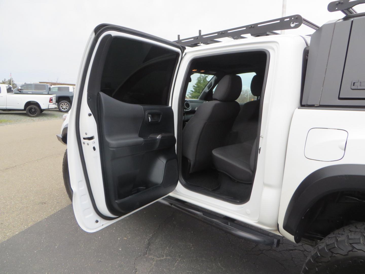 2016 White /GREY Toyota Tacoma TRD OFF-ROAD Double Cab Long Bed V6 6AT 4WD (3TMCZ5AN3GM) with an 3.5L engine, automatic transmission, located at 2630 Grass Valley Highway, Auburn, CA, 95603, (530) 508-5100, 38.937893, -121.095482 - Looking for the ultimate overlanding vehicle. Look no further than this purpose built Tacoma set up for all of your adventures. - Photo#47